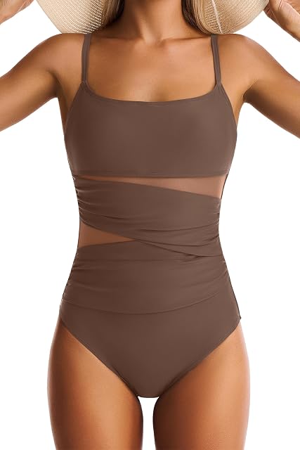 A fashion-forward swimsuit featuring strategic color-blocking and diagonal paneling.